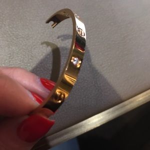 Half of Cartier Love Bracelet w/ diamonds